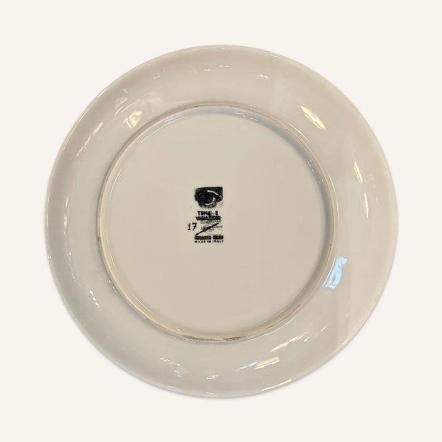 This Piero Fornasetti decorative plate features the head of Lina Cavalieri with an eyeball in her mouth and no eyeballs in...