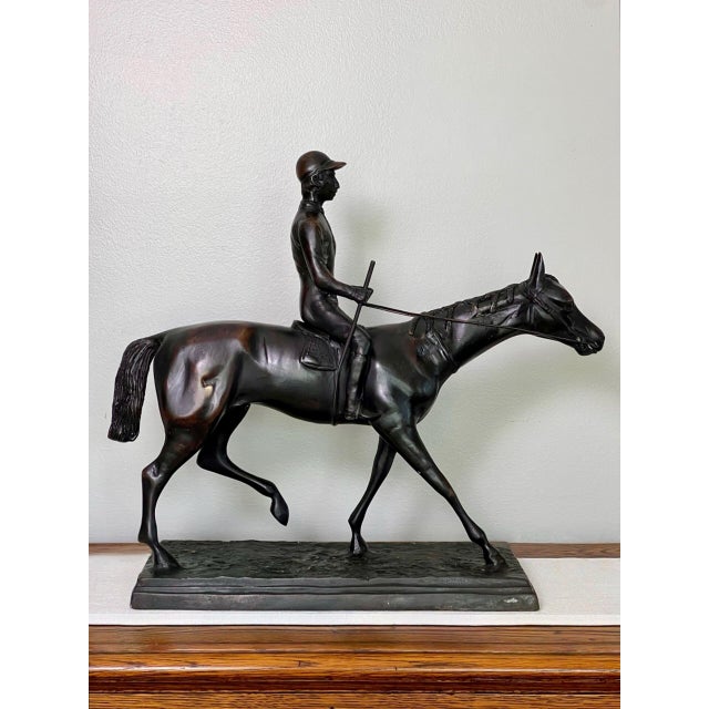 Patinated bronze equestrian sculpture of a Jockey on a Horse in the manner of Isidor Bonheur. This is an unsigned...