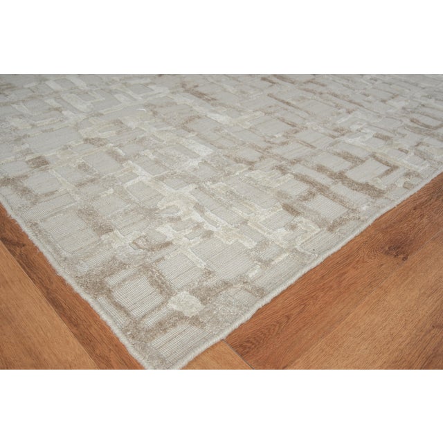 The Vista rug reimagines contemporary design with its dramatic high low patterns and exciting color palette. An allover...