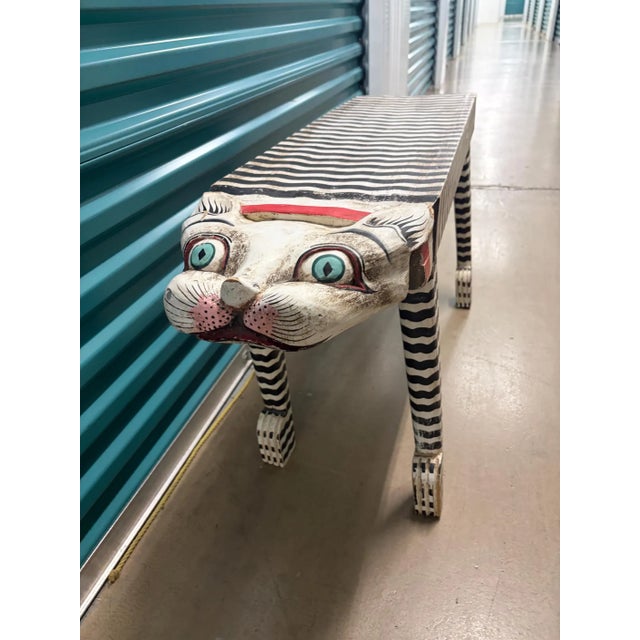 I dare you to resist :) This is simply an adorable vintage folk art cat bench. We sold a similar cat in black and yellow...