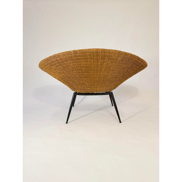 Sculptural Italian Wicker Armchair 1960s Italian Wicker Chair A beautiful and sleek 1960s shell-shaped wicker armchair...
