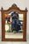 Antique Victorian Carved Oak Wood Ribbon Crest Beveled Glass Wall Mirror. Circa Early 20th Century. Measurements: 48" H x...
