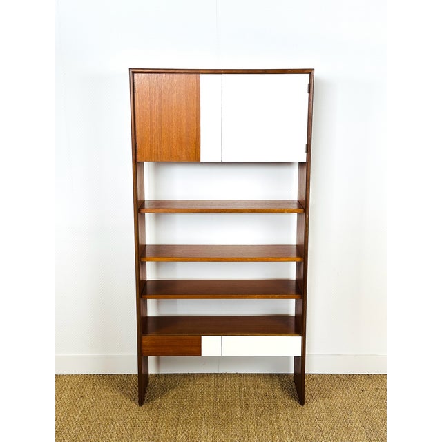 Elegant vintage bookcase by g plan, an iconic piece of 1960s british design, combining warm teak wood with a minimalist...