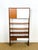 Elegant vintage bookcase by g plan, an iconic piece of 1960s british design, combining warm teak wood with a minimalist...