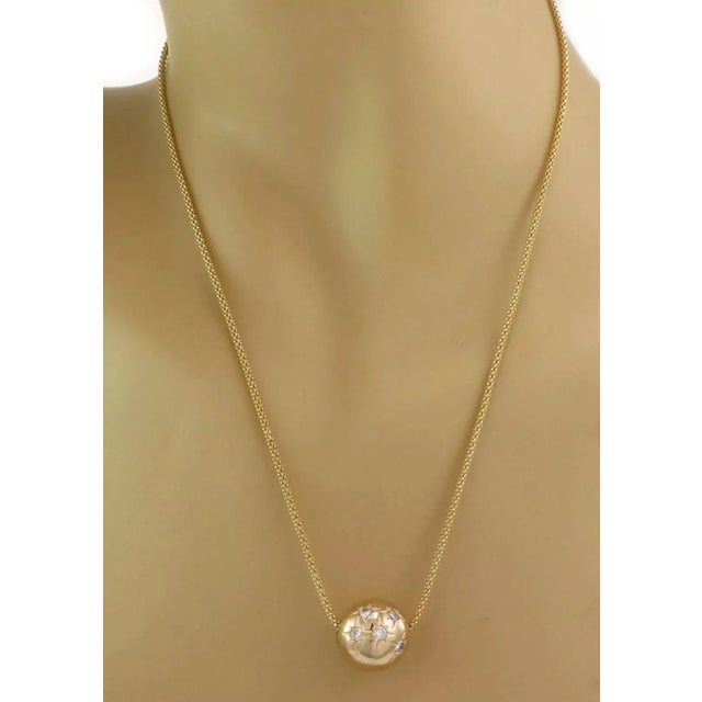Hallmark: 14k Diamond: 0.50ct Material: 14k yellow gold Measurement: Chain: 19" long x 1.7mm thick Pendant: 15.3mm ball...