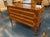 The product is a pair of Italian walnut commodes with an inlaid Greek key pattern. The commodes feature a luxurious walnut...