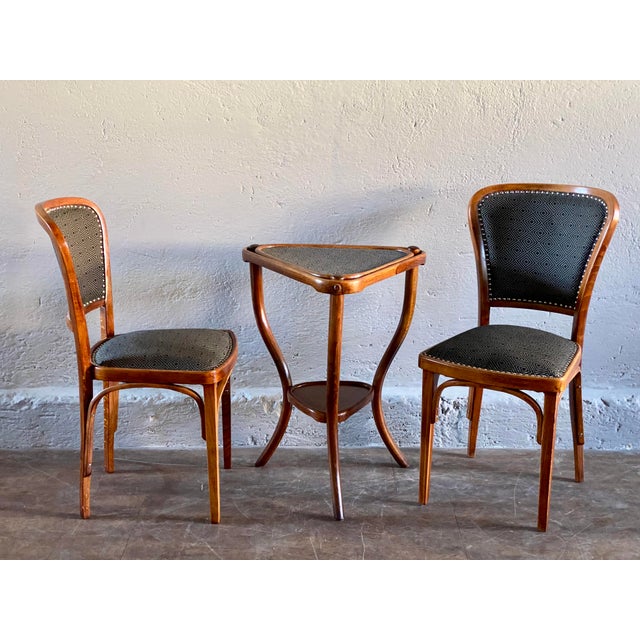 Newly upholstered and covered. Table dimensions: 73 cm high, max. width / depth 56 cm. This piece has an attribution mark,...