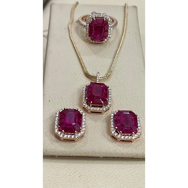 12 Carat Natural Burma Ruby and Diamond Earring in 18 Karat Yellow Gold This spectacular earrings consisting of natural...