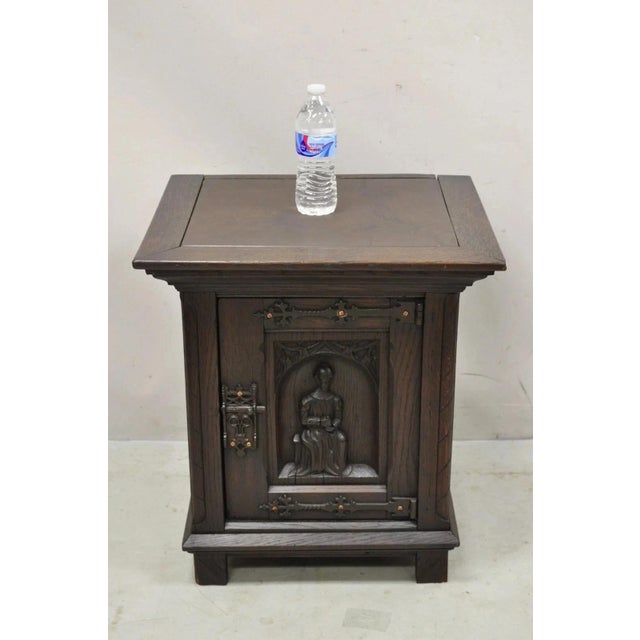 Antique Gothic Renaissance Revival Oak Figural Carved Low Cabinet Pedestal Side Table. Item features relief carved figure...