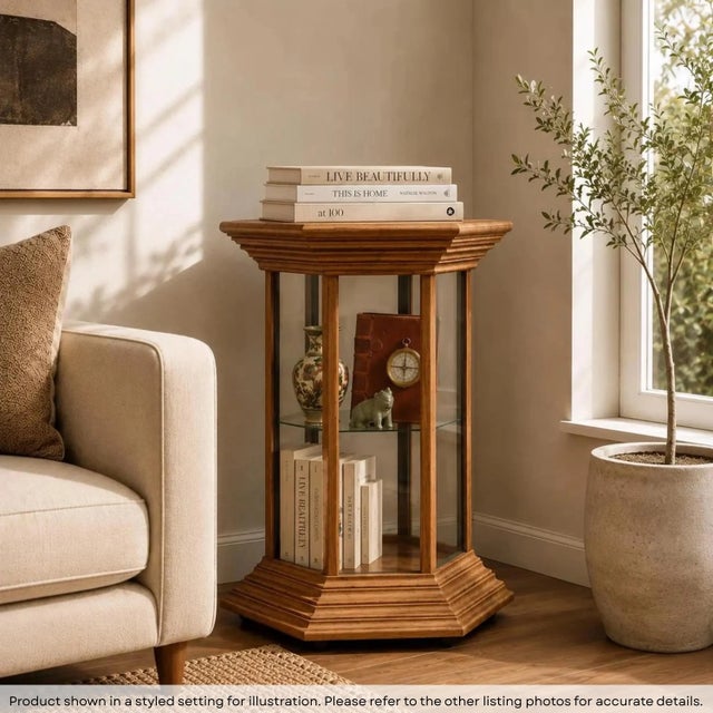 This is a vintage Teak wood hexagon end table with glass inset on all 6 sides. The top of the table can be lifted up to...