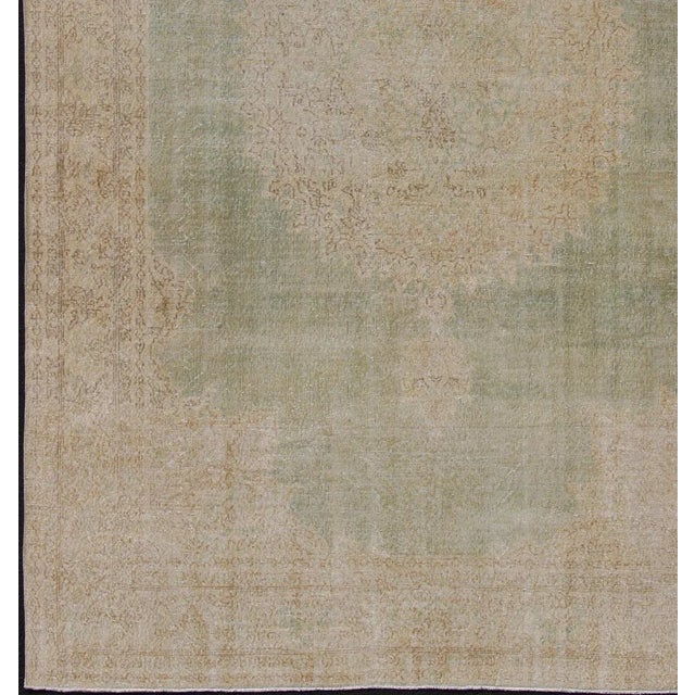 Transitional Distressed Turkish Rug With Floral Medallion in Light Green, Tan and Taupe For Sale - Image 3 of 13