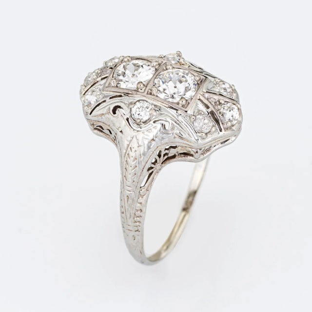 Elegant & finely detailed Belais Art Deco era ring (circa 1920s to 1930s) crafted in 14k white gold. Two centrally mounted...