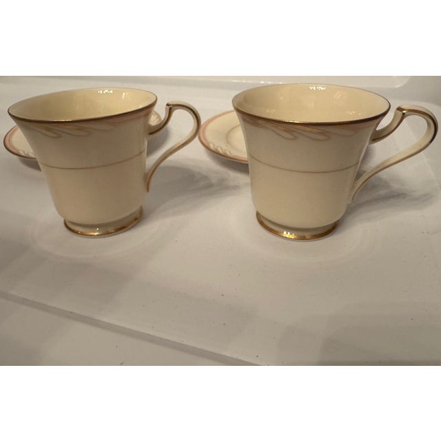 Vintage Oscar de la Renta fine ivory demitasse cup and saucer set in the “Hospitality Peach” pattern. This elegant set...