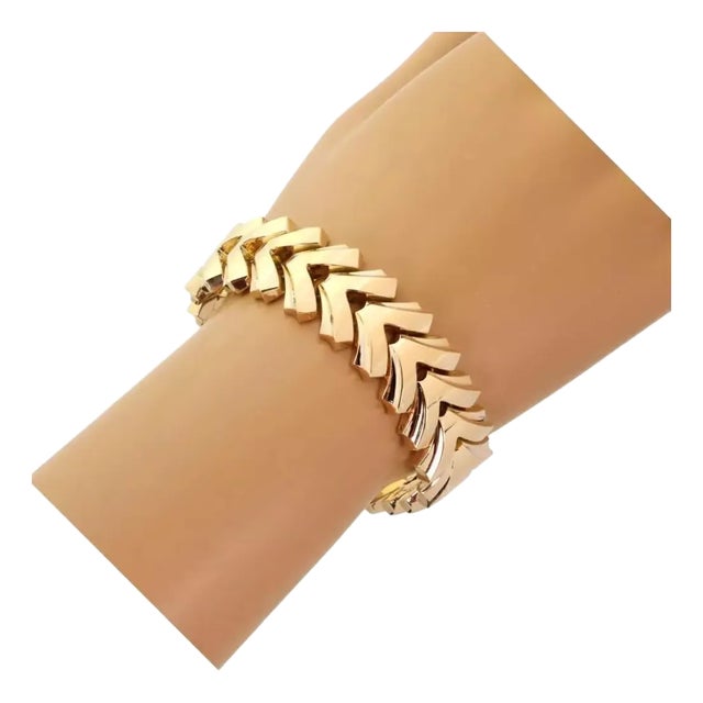 This is a beautiful wide Retro bracelet, it is crafted from 18k rose gold with a high polished finish featuring fancy V...