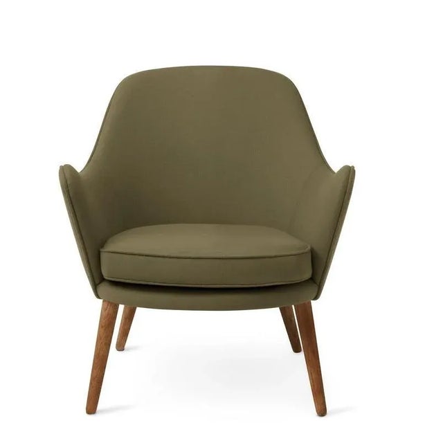 Dwell lounge chair olive by Warm Nordic Dimensions: D 69 x W 66 x H 73 cm Material: Textile upholstery, Solid smoked or...