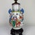 Darling little Famille Rose lamp on stand. Depicting a court scene and fantastic colors. The antique face was broken at...