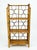 This is a stunning vintage 3-tier bamboo and rattan folding etagere, bookshelf featuring a warm, tortoiseshell, "burnt...