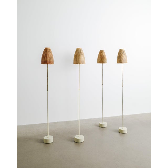 A very rare set of four swedish mid century "s-1871" floor lamps in grey lacquered metal and brass with decorative and...