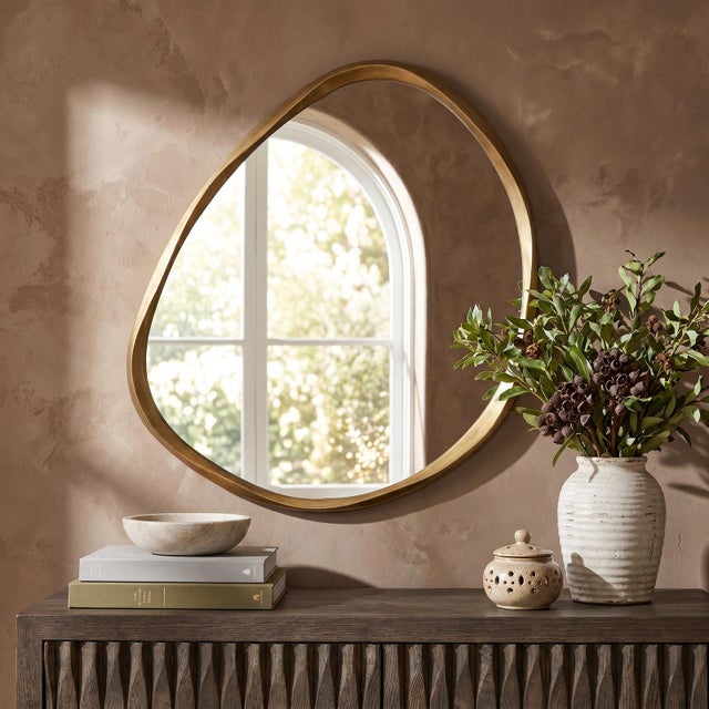 The beauty of the Monte Mirror is in its unique, organic shape. The slightly undulating, asymmetric mirror is made...