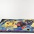 This rug was manufactured by Shahbano, Germany, in the 1980s. It features a modernist composition by Wassily Kandinsky....