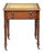 A fine diminutive English library table or writing desk from the 19th century, featuring a moulded rectangular top with...