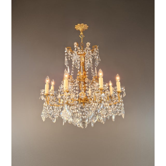 An exceptional antique crystal chandelier from the late 19th century. The traditional combination of different materials...
