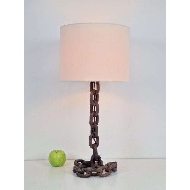 Mid century table lamp chain links France '50s vintage brutalist An unconventional table lamp in the style of a work from...