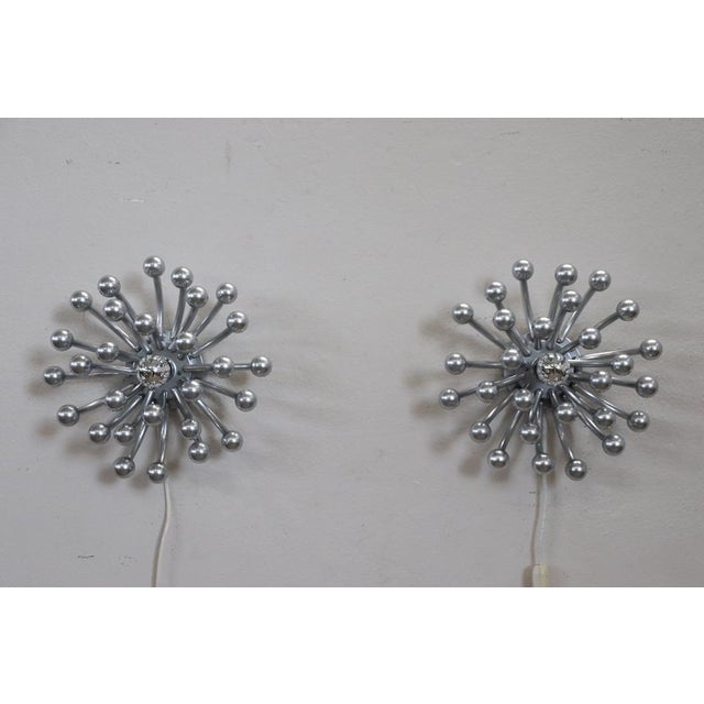 This is an extraordinary pair of Italian design lamps, featuring the Valenti & C. manufacturing mark under the base....