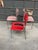: Set of 3 vintage cantilever chairs with tubular chrome frames and black armrests. Two chairs have been reupholstered...
