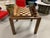 A custom made walnut and maple chess set and game table we commissioned. It is solidly made with squares of curly maple...