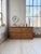 A 1950s pine workshop cabinet with large drawers. we love its clean lines and the four wide drawers topped with wooden...