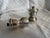 Two petite sterling silver grinders. One is for salt and the other is for pepper. Both grinders function well and make a...