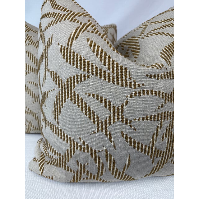 Custom pair of 22" pillows covered in Nobilis "Laurus" in color 10850.14. These pillows have tapered corners to prevent...