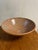 Soft peach earth tone studio pottery pedestal bowl with sweeping graphic pale gray line work great for kitchen, fruit...