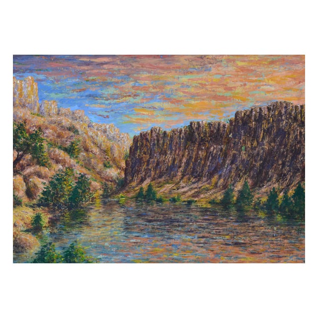 Vibrant painting of the Utah desert range by an unknown artist. Unsigned. Presented in a painted wood frame with linen...