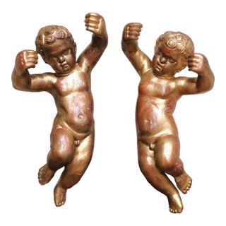 Pair of 19th Century Italian Giltwood Wall-Hanging Cherub Sculptures For Sale