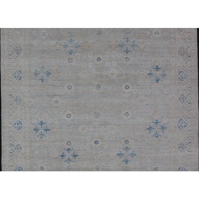 Measures: 8'0 x 10'2 Modern All-Over Floral Oushak with Light Gray Background And Neutral Colors. Keivan Woven Arts rug...