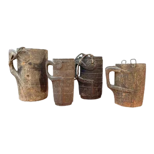 Early 20th Century Nepalese Carved Milk Jugs- a Set of 4