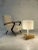An enormous table lamp or rather, floor lamp, Post-Modernist, Bauhaus, thick triangular base in wood veneered with...