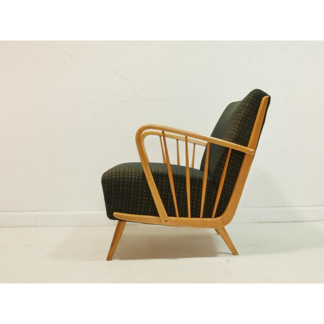 This beautifully designed cocktail chair from the 1960s impresses with its elegant, light lines and exceptional seating...