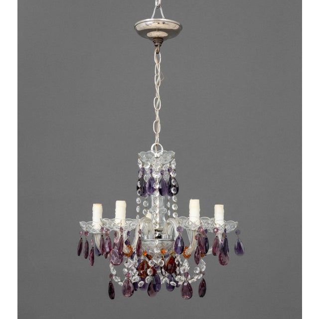 Murano Amethyst Glass Five-Branch Chandelier, five candlestick style arms draped with amethyst and amber pendants, and...
