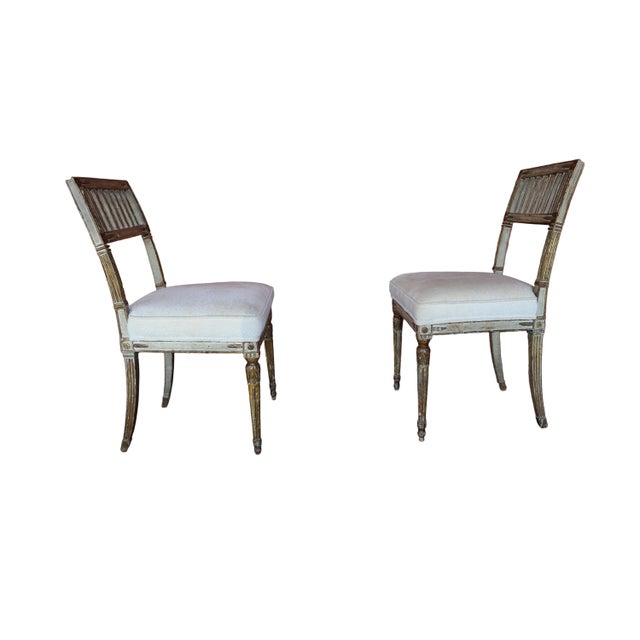 Fusing French neoclassicism with Swedish simplicity, each of these remarkable Gustavian style accent chairs features...