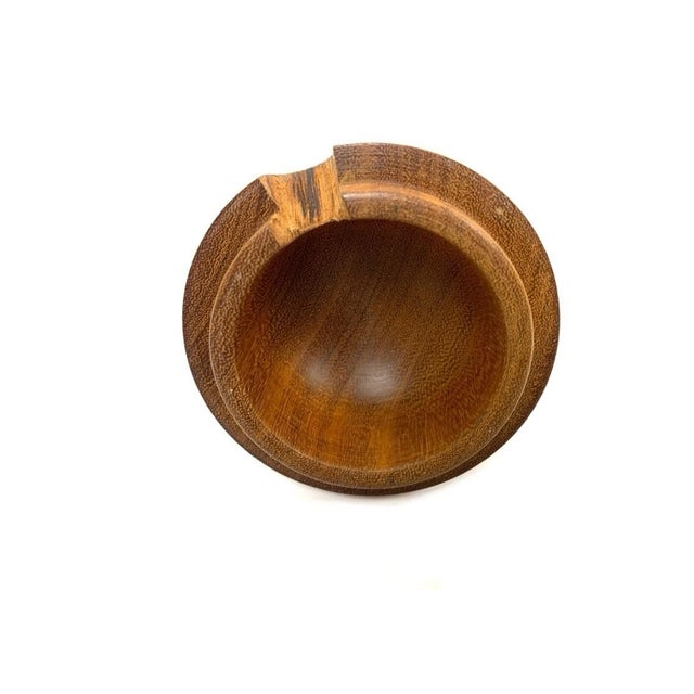 Well crafted turned and lidded Fruit form vessels in and Pear and Apple shape made from a fine mix of woods including...