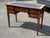 Kingswood Veneer Desk, Elegant, And Impressive. Red Top. Looks beautiful front back and sides. Strong and solid Does have...