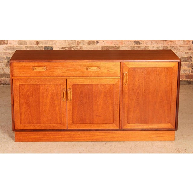 Mid Century G-plan Fresco teak sideboard, circa 1960s. 2 cabinet section and a drawer with cutlery compartments. Excellent...