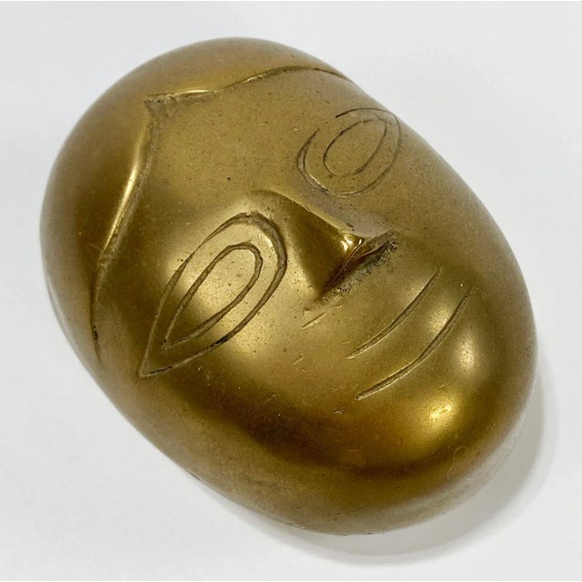 Vintage Dolbi Cashier heavy lidded brass box featuring postmodern face design to lid. Whimsical and classic Dolbi Cashier...