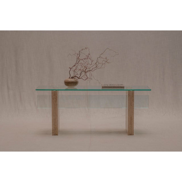 A striking and elegant modernist console table from Italy, dating to the 1970s. The design is defined by its strong...