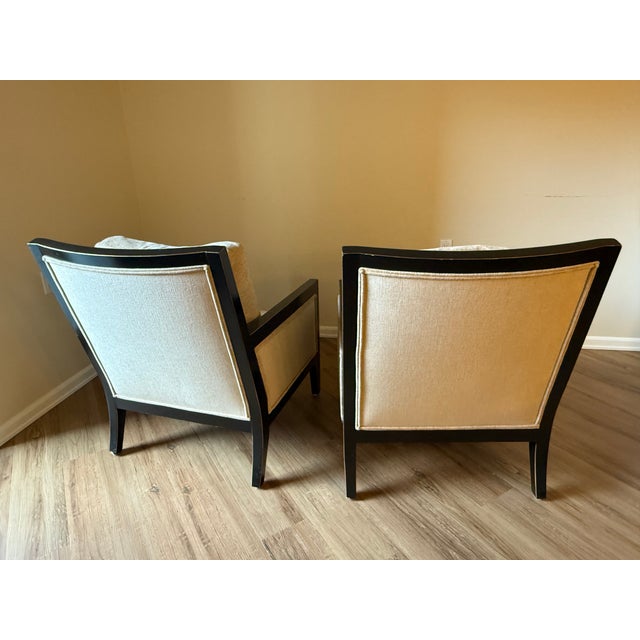 Kreiss side chairs. Set of 2 upholstered siding with sleek wood finish. Back pillows included.