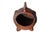 A brown ceramic fish ashtray in the style of Swedish artist Gunnar Nylund for Rörstand. A round body is defined with a...