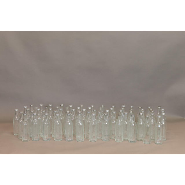 Miniature French tablespoon measure bottles. Circa 1950.